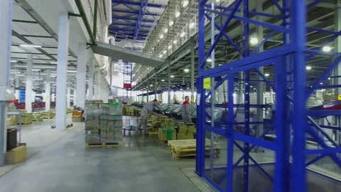 TVER - MAY 17, 2017: Workers get parcels from conveyor in Ozon company logistic Stock Footage 82682624