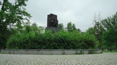 Tvrtko Kotromanic Statue in Gradski Park, Tuzla, Bosnia, pan left-Rec709 Stock Footage