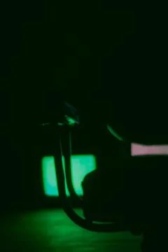 TVs with interference in dark rooms Stock Photos