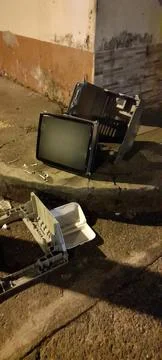 TVs with interference in dark rooms Stock Photos