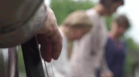 Twangleing with dancers in the background Stock Footage 54363701