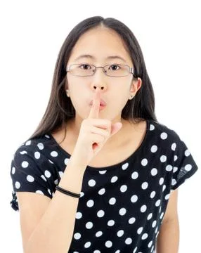 Tween Girl With a Silence Gesture Stock Photos
