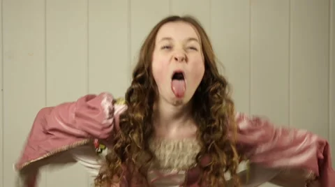 A tween princess pulling faces at the camera Stock Footage 44116167