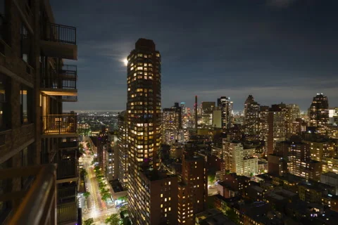 Twelve Hour Full Lunar Eclipse Cityscape (1 of 3) Stock Footage 194639909