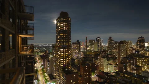 Twelve Hour Full Lunar Eclipse Cityscape (1 of 3) Stock Footage 194640505