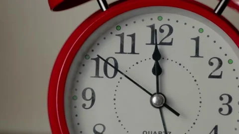 Twelve o'clock on the clock, the second hand moves from nine to two Stock Footage 176370362