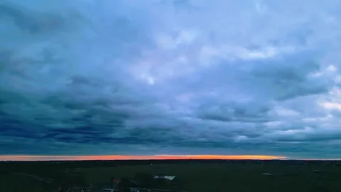 Twente sunset horizon cloudy dramatic sky across a vast rural landscape with a Stock Footage 307576253