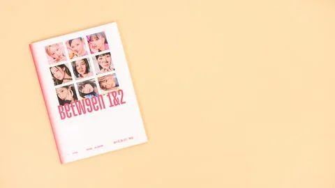 Twice Between 1 and 2 mini Album Box set on yellow. Music CD. South Korean .. Stock Photos