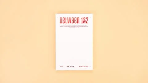 Twice Between 1 and 2 mini Album Box set on yellow. Music CD. South Korean girl Stock Photos
