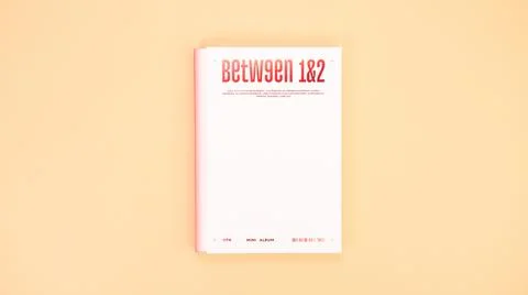 Twice Between 1 and 2 mini Album Box set on yellow. Music CD. South Korean .. Stock Photos