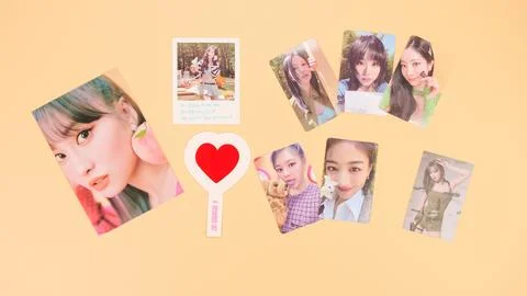 Twice Between 1 and 2 mini Album Box set on yellow. Red music disc in white cd Stock Photos