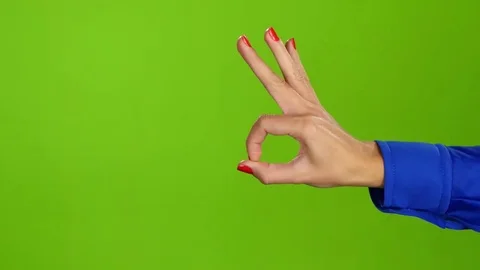 Twice per frame hand shows gesture fingers okay, all right Stock Footage
