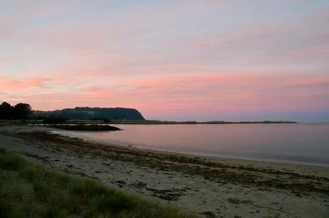 Twilight after a sunset at a beach, long exposure Stock Photos