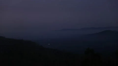 Twilight and Final light over small country town in the mountains Stock Footage