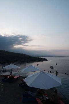 Twilight Bay Views from Elevated Restaurant Deck in Amed Stock Photos