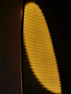 Twilight cats a shadow over the window shade at 40,000ft Fotos Stock