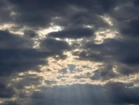 Twilight Clouds With Shining Rays. Nightfall Over Storm Clouds With Shimmer.. Stock Photos