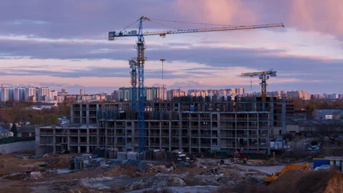 Twilight Construction Site With Tower Crane Against Cloudscape And Urban Sk.. Stock Footage 308928644