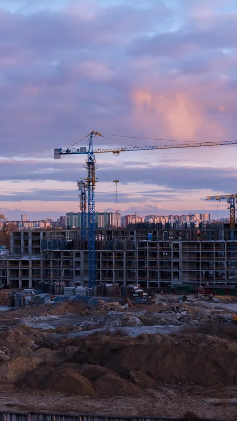 Twilight Construction Timelapse: Tower Crane Against Urban Development With.. Stock Footage 307497931