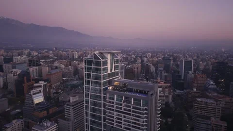 Twilight drone arc over helipad tower in Las Condes Santiago Chile Vídeos de archivo 334637376