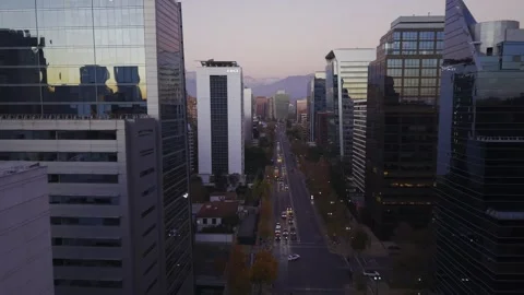 Twilight drone flight along Apoquindo office corridor Santiago Chile 库存影片 334637339