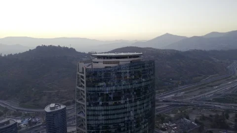 Twilight drone orbit around Titanium La Portada and highway Santiago Chile Vídeos de archivo 334637295