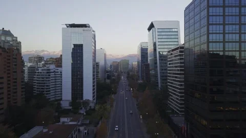 Twilight drone slide through Apoquindo office canyon Santiago Chile Stock Footage 334637269