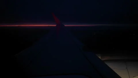 Twilight on the horizon from the plane's window 動画素材 265853331
