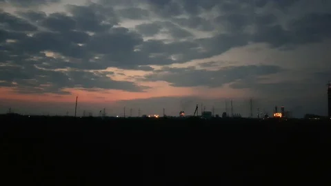 Twilight in the industrial zone. Panoramic 4k video Stock Footage 120633352
