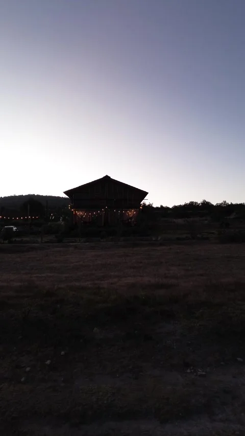 Twilight landscape in Mexico with cabin in shadow dolly camera movement Stock Footage 322129079