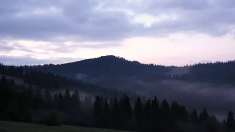 Twilight in the mountains. Horizontal panning. Stock Footage 76769296