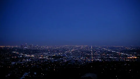 Twilight night downtown skyline los angeles from griffith park wide Stock Footage 83559119