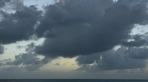 Twilight to night time lapse of clouds over sea Stock Footage 63303754
