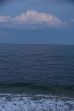 Twilight at the ocean with cloud Stock Photos