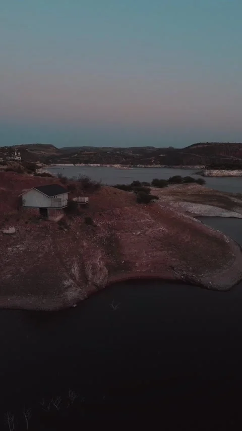 Twilight over a dwindling lake in the semi-desert  Tilldown Stock Footage 304303376