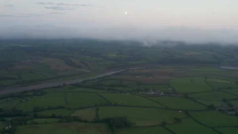 Twilight over Fields and Farms from a drone, River Towy, Carmarthen, Wales Stock Footage 250799566