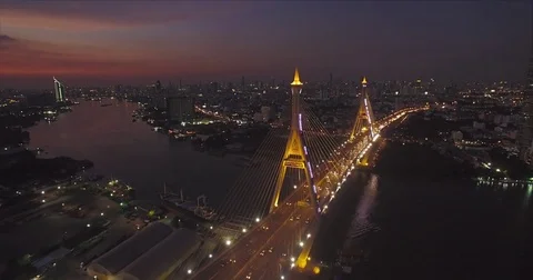 Twilight Over Illuminated Chao Phraya River Bridge, Bangkok, Thailand, Aerial Stock Footage 79532035