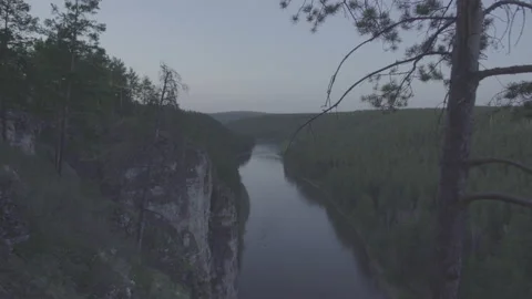 Twilight over the river. Rocky riverside Stock Footage 130744503