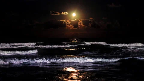 Twilight over sea waves. Full moon rising over sea waves, 4k video Stock Footage 149899259