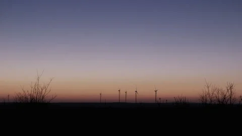 Twilight Over Wind Farm with Crescent Moon Stock Footage 282925595