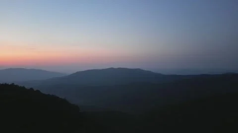 Twilight Panorama of Misty Hills Stock Footage 328964694