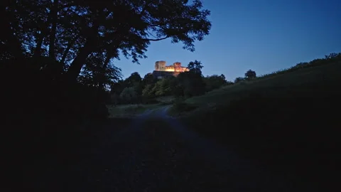 Twilight Path Leading to Castello di Torrechiara on Hilltop Stock Footage 344589525