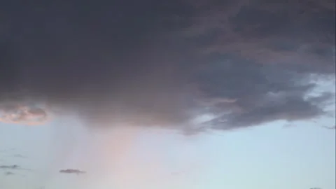 Twilight Rainfall in the Summer Evening Sky Stock Footage 331985031