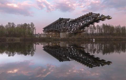 Twilight Reflection of an Unfinished Bridge Stock Photos