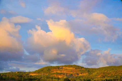 Twilight sky after sunset, clouds in red, orange ,blue, violet, purple, cri.. Stock Photos