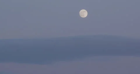 Twilight Sky with Bright Full Moon Stock Footage 332378298