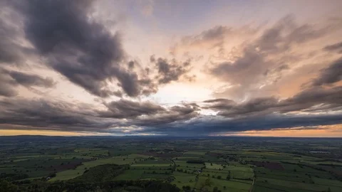 Twilight Sky with Colorful Dramatic Clouds over British Countryside Stock Footage