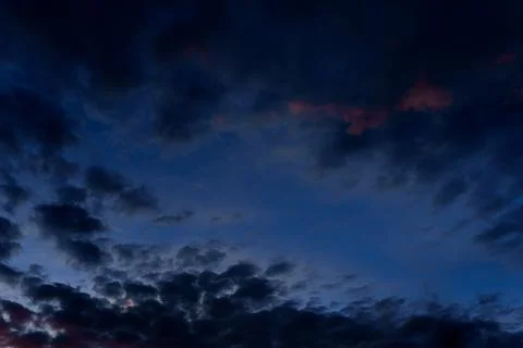 Twilight sky with dark storm clouds and fading light in color 2025 future dus Stock Photos