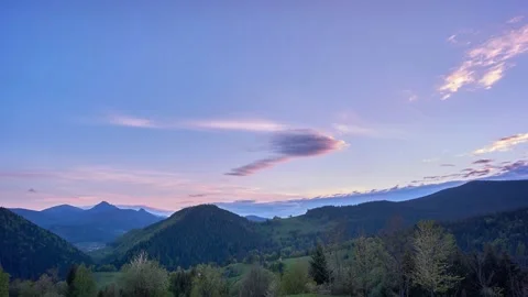 Twilight in the spring forest hilly landscape  clouds are forming in the sky. Vidéo 154914900