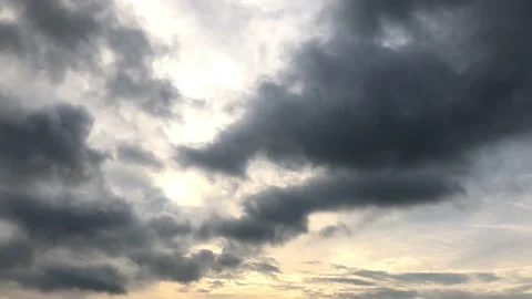The twilight sun covered with the movement of black clouds Stock-Footage 220759846